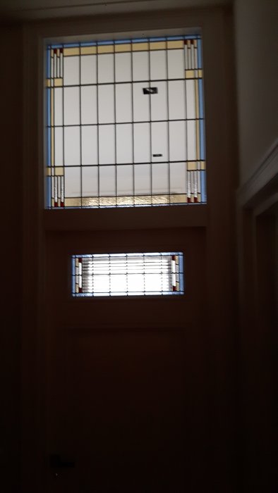 Amsterdam - nieuw (bijpassend) glas-in-lood en restauratie