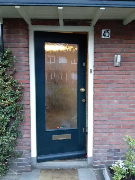 Zutphen - nieuw glas-in-lood in voordeur, in dubbel glas