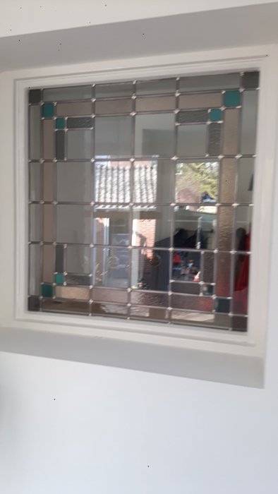 Huizen - nieuw glas-in-lood voor