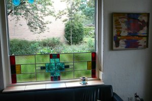 Huizen - voorzetraam met glas-in-lood